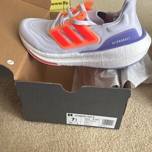 Adidas White and Orange Sneakers with Ultraboost Cushioning